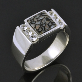 Mans gray dino and white sapphire ring