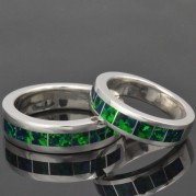 His and hers lab created opal wedding ring set.